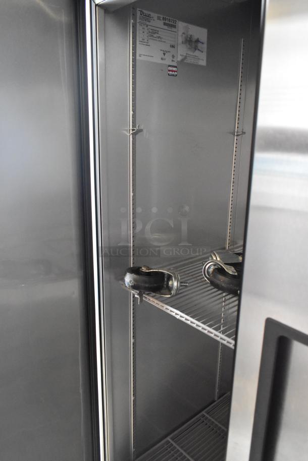 2016 True T-35 stainless steel 2-door reach-in cooler, poly-coated racks, commercial casters, 115 volts, 1 phase.