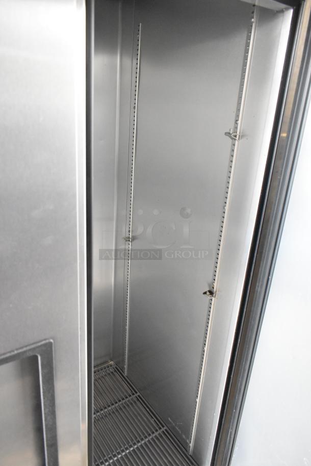 2016 True T-35 Stainless Steel 2-Door Reach-In Cooler interior with poly-coated racks, commercial casters, 115V, 1 Phase.