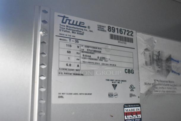 2016 True T-35 stainless steel commercial cooler label, 115V, 1 Phase, features poly-coated racks, commercial casters.