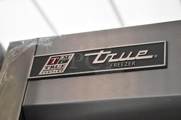 2017 True T-19F stainless steel commercial freezer, single door, poly-coated racks, on casters, 115V, 1 phase.