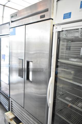 2018 True T-35-HC stainless steel commercial 2-door reach-in cooler with poly coated racks, 115 volts, 1 phase.