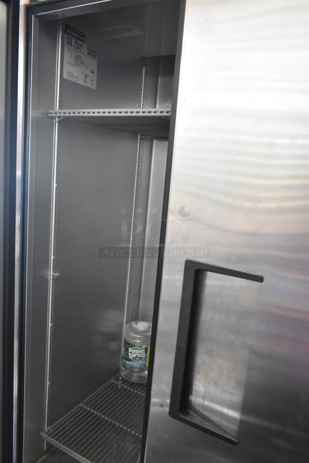 2018 True T-35-HC stainless steel commercial 2-door cooler with poly-coated racks, 115V, 1 phase. Clean interior, visible label.