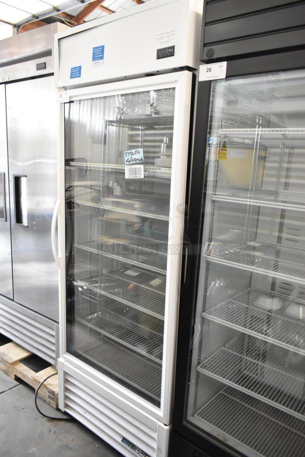 2021 True TSCI-600R-G-PH commercial cooler with glass door, poly coated racks, 115V, 1 phase. Excellent condition.