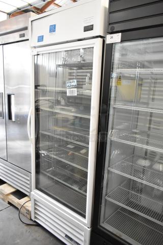 2021 True TSCI-600R-G-PH commercial cooler with glass door, poly coated racks, 115V, 1 phase. Excellent condition.