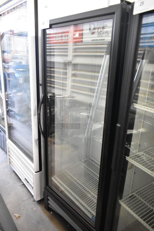 2018 True GDM-12-HC single door merchandiser cooler, glass door, metal body, poly coated racks, 115V, good condition.