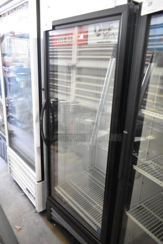 2018 True GDM-12-HC single door merchandiser cooler, glass door, metal body, poly coated racks, 115V, good condition.