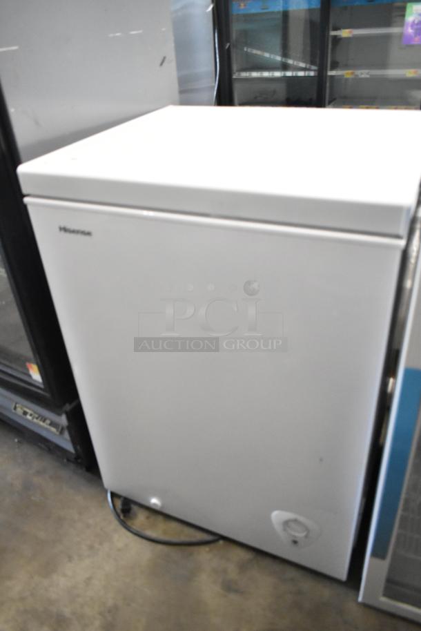 Hisense WFC050M6XWD metal chest freezer with hinge lid, 115 volts, 1 phase, good condition, white exterior.