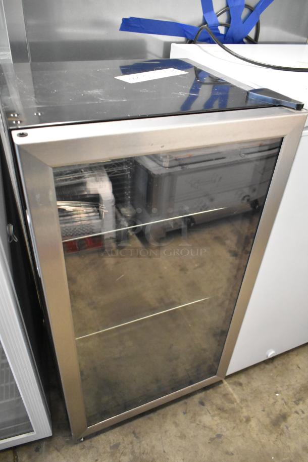 Two metal mini cooler merchandisers, Accucold ARG3PV, Arctic King ARV115B1AST, 115 volts, 1 phase, reflective doors.