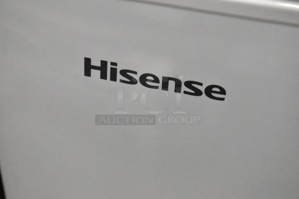 Hisense WFC050M6XWD metal chest freezer with hinge lid, 115 volts, 1 phase, showing brand logo.