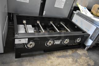 "Backyard Pro 36-inch steel propane griddle, 60,000 BTU, brand new with minor scratches, folding mobile design, visible controls."