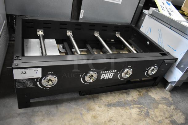Brand new Backyard Pro 36" steel propane griddle, 60,000 BTU. Features folding design, labeled controls, slight scratches.