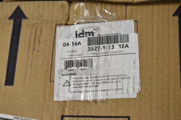 Cardboard box with a label showing "Made in Israel," barcode, a warning about chemical exposure, and shipping details.