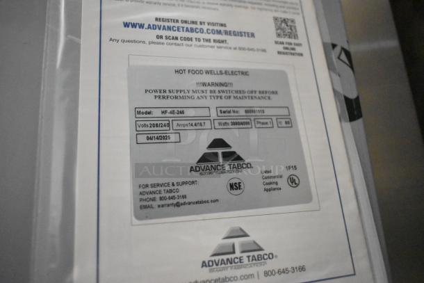 Advance Tabco HF-4E-240 stainless steel steam table label; shows model, voltage, and serial details. 208/240V, 1 phase.