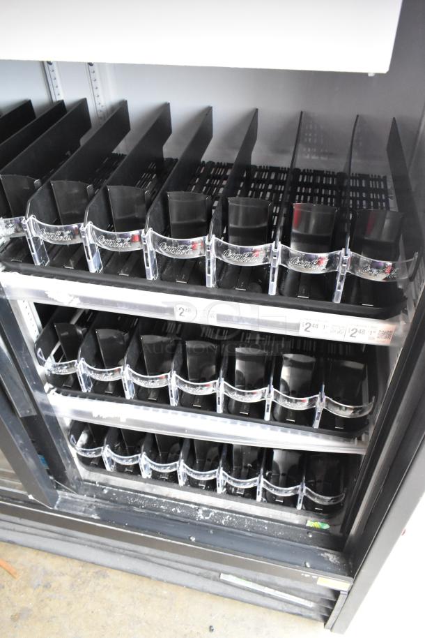 2019 True GDM-41SL-48-HC-LD cooler, 2-door, poly racks, metal, 115V, commercial use, shelving for beverages.