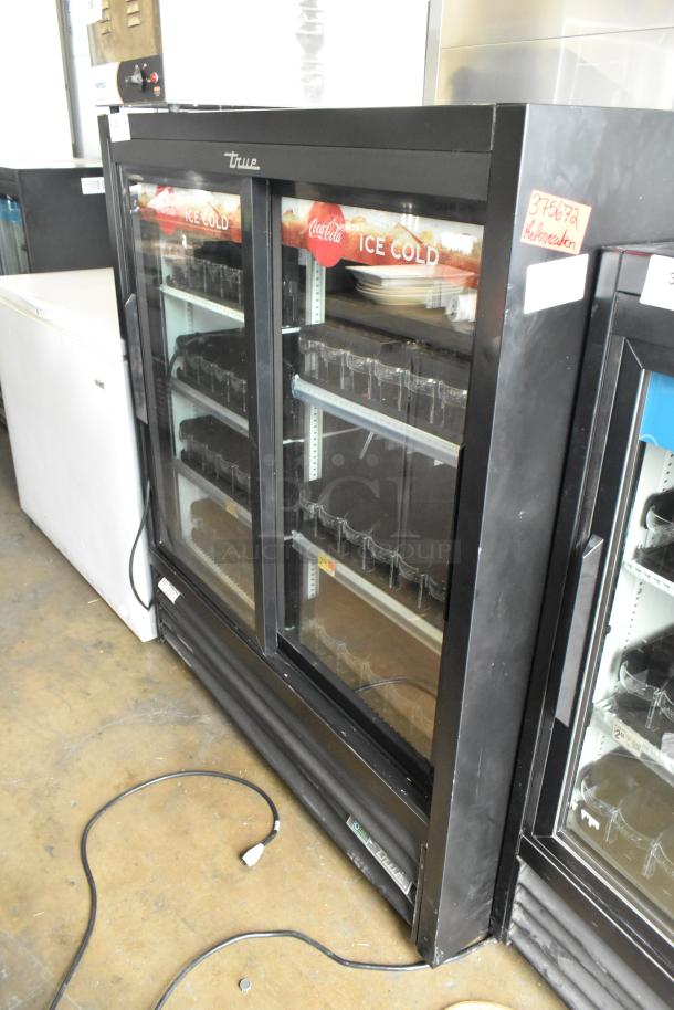 2020 True GDM-41SL-54-HC-LD commercial cooler, 2-door reach-in, poly-coated racks, 115 volts, good condition.