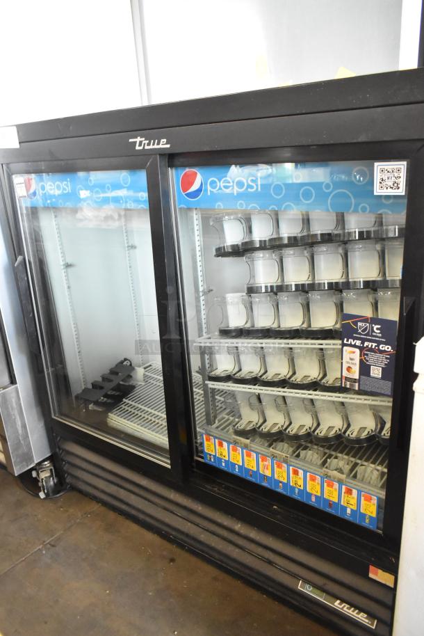2019 True GDM-41SL-48-HC-LD commercial 2-door cooler, metal finish, poly-coated racks, Pepsi branding, 115V, 1 phase.