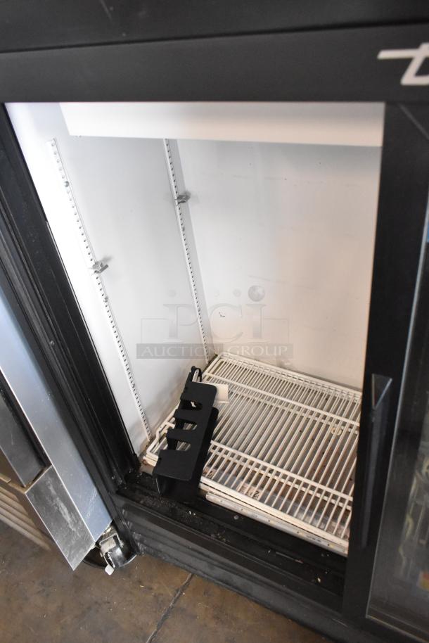 2019 True GDM-41SL-48-HC-LD 2-door cooler, metal exterior, poly-coated racks, 115V, excellent for commercial use.