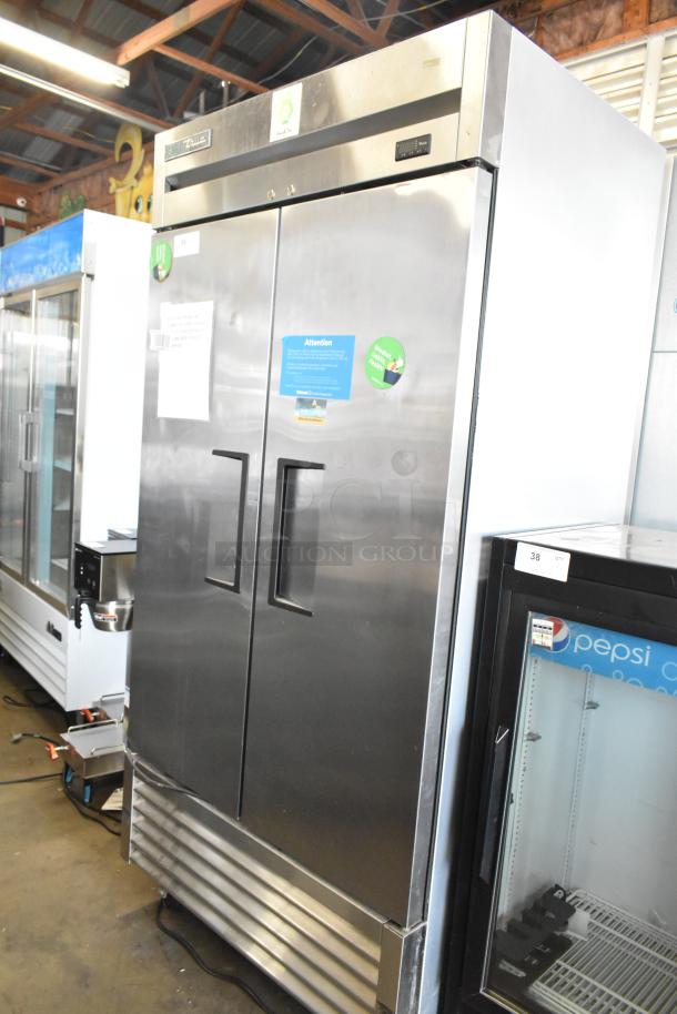 2018 True T-35-HC stainless steel 2-door cooler, poly-coated racks, on casters. 115 volts, 1 phase, commercial use.