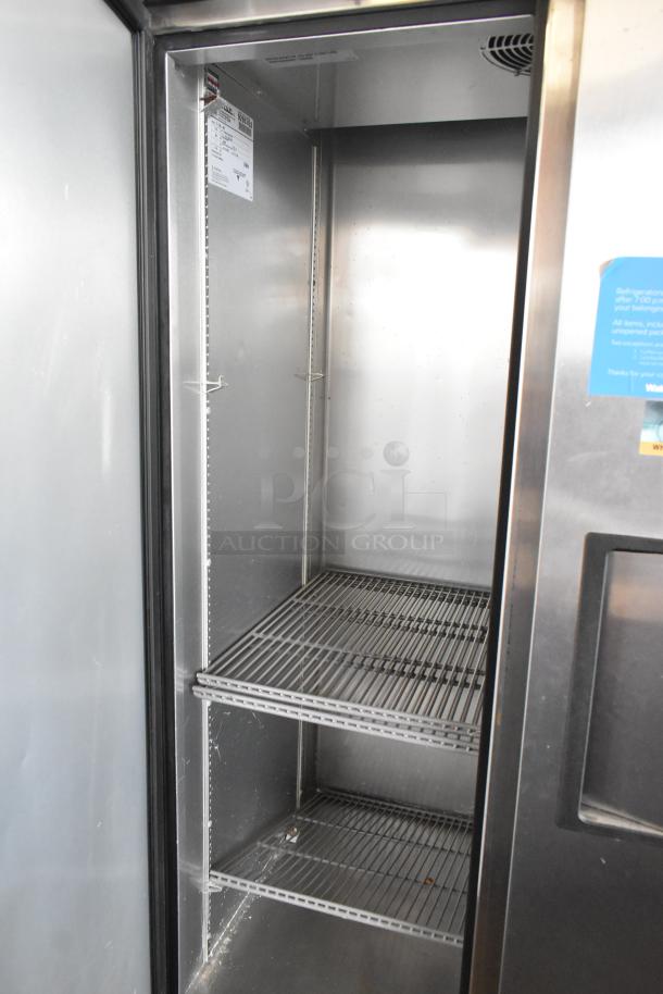 2018 True T-35-HC stainless steel 2-door reach-in cooler with poly-coated racks; on commercial casters, 115V, 1 phase.