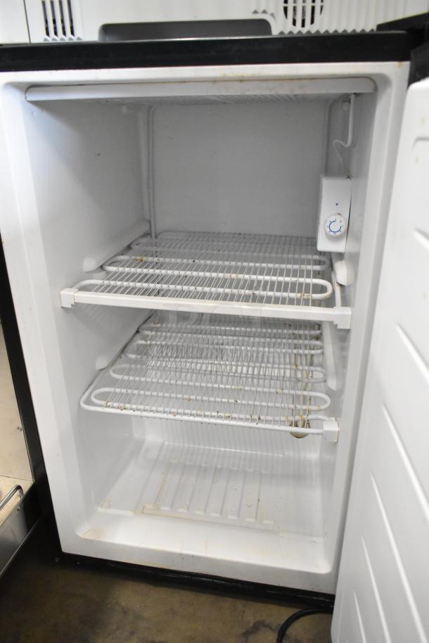 Magic Chef MCUF3S2 mini cooler with two wire shelves, temperature dial. Slight interior wear. 115V, 1 phase.
