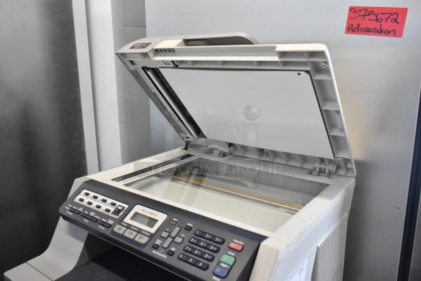 Brother MFC-9440CN scanner copier printer fax machine, open lid, control panel visible, model label shown.