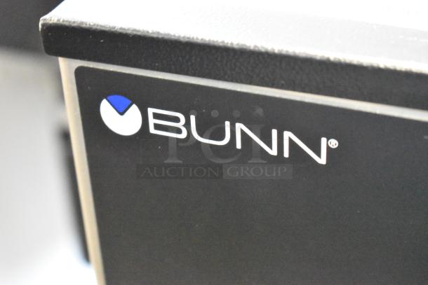 Bunn SINGLE SH DBC coffee machine, stainless steel, new scratch and dent, with hot water dispenser. 120V, 1 phase. Brand logo visible.