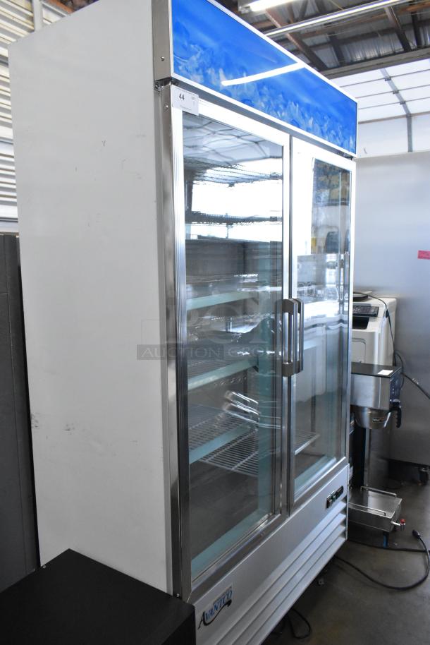 Brand new Avantco 178GDC40HCW 48" white merchandiser refrigerator, glass doors, LED lighting, poly racks, on casters.
