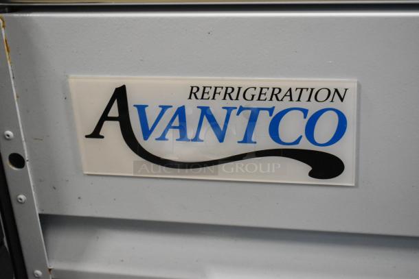 "Avantco logo on 2023 Avantco 178GDC40HCW 48-inch merchandiser refrigerator. Features swing glass door, LED lighting."