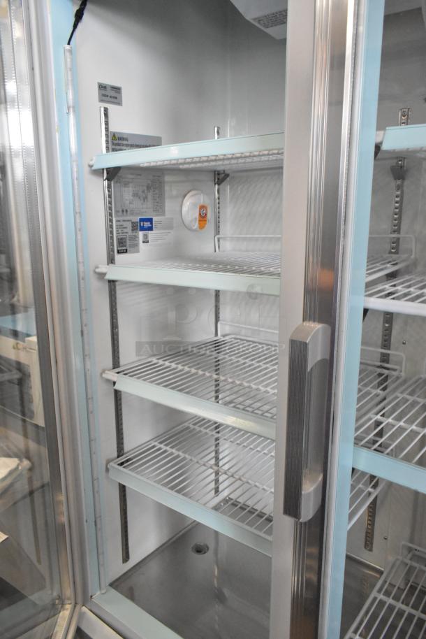 Brand new 2023 Avantco 178GDC40HCW 48" customizable glass door refrigerator, LED lighting, poly coated racks, on casters.