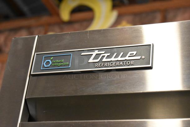 2021 True T-35-HC stainless steel cooler, two doors, poly coated racks, 115V, 1 phase, "natural refrigerant" badge.