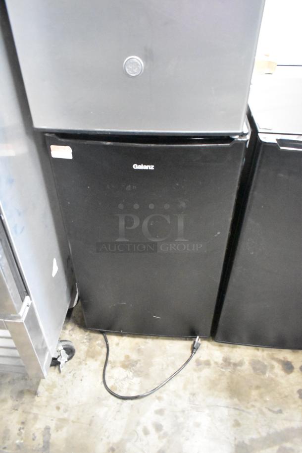 Three mini coolers: 1 General Electric GDE03GLKBLR, 2 Galanz GL35BK; 115 volts, 1 phase. Good condition.