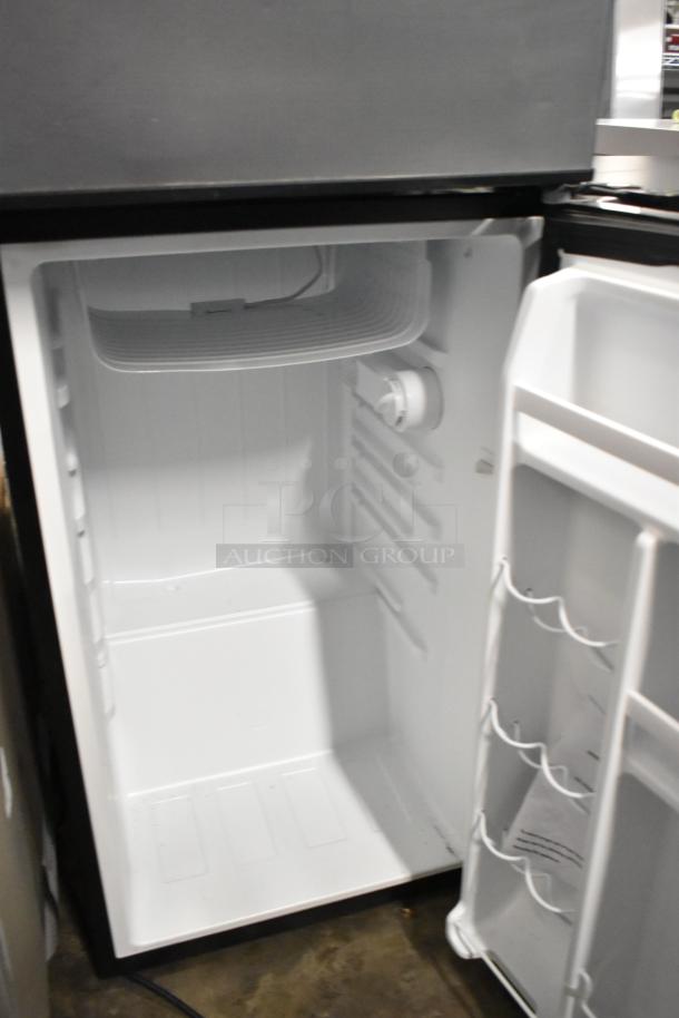Three mini coolers, including General Electric GDE03GLKBLR and two Galanz GL35BK, 115 volts, 1 phase, open door view.