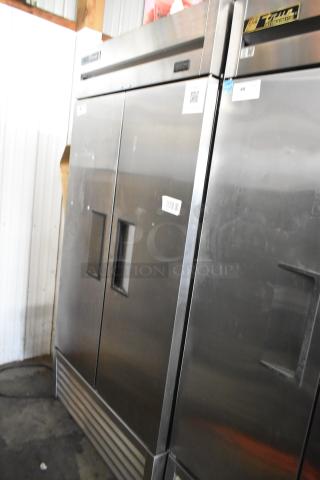 2024 True T-35 stainless steel commercial cooler with 2 doors, poly coated racks, on casters. 115 volts, 1 phase.