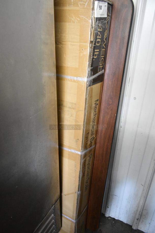 Brand new 334MSB440 eye-level mechanical beam physician's scale box, with some packaging wear, includes height rod.