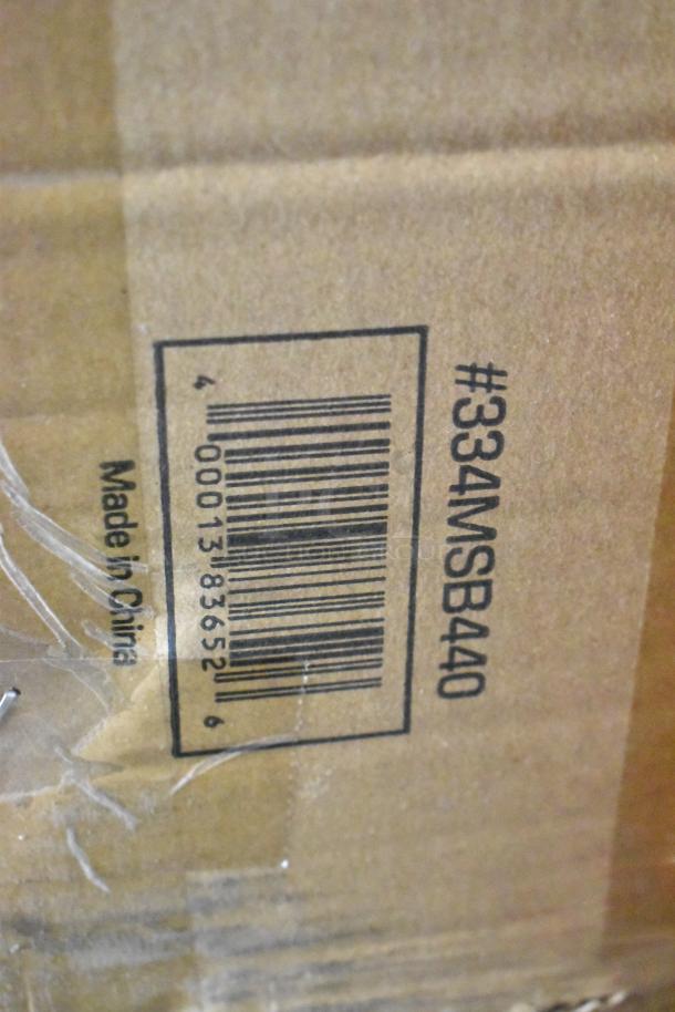 Cardboard box labeled "#334MSB440" with barcode, indicating it's for a brand new 440 lb. eye-level mechanical beam scale.
