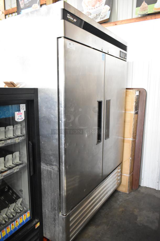 Turbo Air TSF-49SD stainless steel commercial freezer, two-door, poly-coated racks, 115V, 1 phase, visible label and signage.