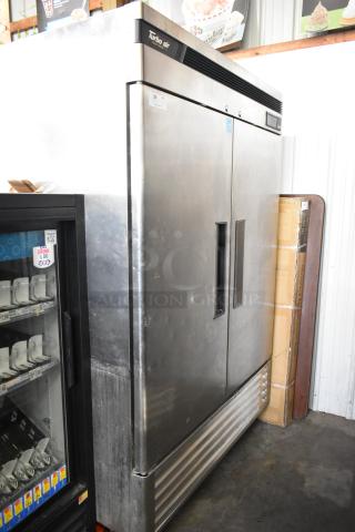 Turbo Air TSF-49SD stainless steel commercial freezer, two-door, poly-coated racks, 115V, 1 phase, visible label and signage.