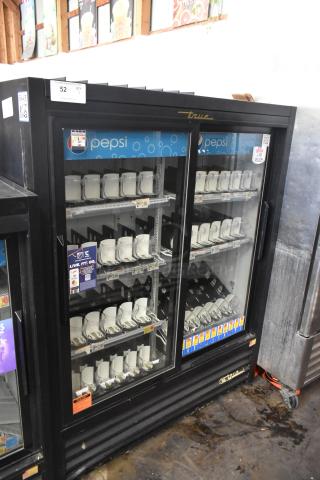 True GDM-41SL-60-LD commercial cooler, 2 glass doors, poly-coated racks, Pepsi signage, auction tag. 115V, 1 phase.