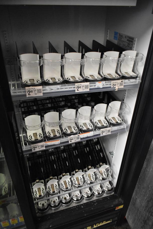 True GDM-41SL-60-LD commercial 2-door reach-in cooler with poly-coated racks, adjustable shelving, 115V, 1 phase.