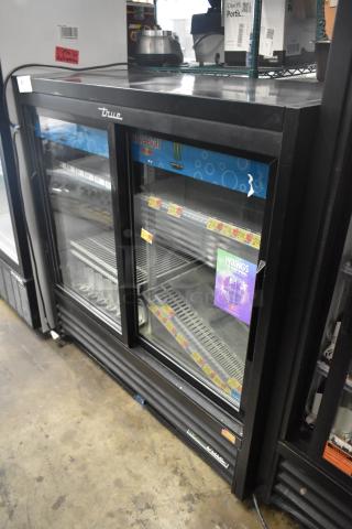 2019 True GDM-41SL-48-HC-LD commercial 2-door cooler, black, with glass sliding doors and poly-coated racks, 115V.