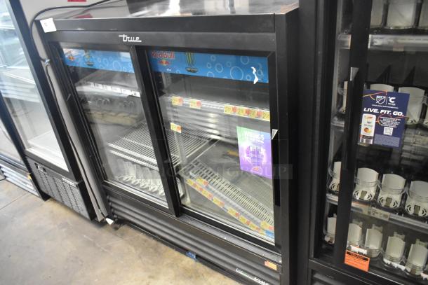 2019 True GDM-41SL-48-HC-LD 2 Door Cooler Merchandiser. Features poly coated racks, 115 volts, 1 phase. Good condition.