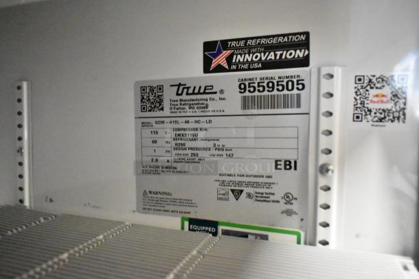 2019 True GDM-41SL-48-HC-LD cooler label showing model, voltage, and refrigerant info. Serial number 9559505.