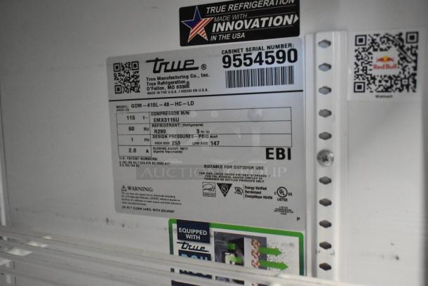 2019 True GDM-41SL-48-HC-LD cooler label showing model, voltage, refrigerant type, and serial number.