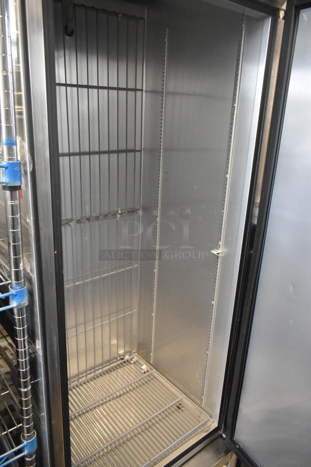 2017 True T-19F stainless steel single door freezer, poly-coated racks, on commercial casters, 115V, 1 phase.
