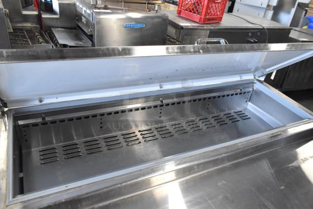 2018 Continental CPA93 stainless steel pizza prep table with open lid, commercial casters, 115V, 1 phase.