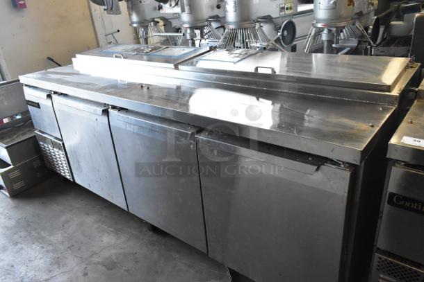 2018 Continental CPA93 stainless steel commercial pizza prep table with casters, 115 volts, 1 phase, used condition.