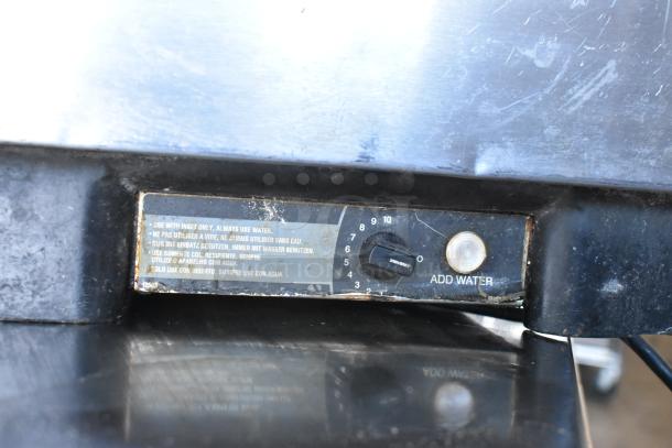 2 metal commercial countertop food warmers, Vollrath 1001, Avantco 177W43, 115 volts, 1 phase, visible knob for control.