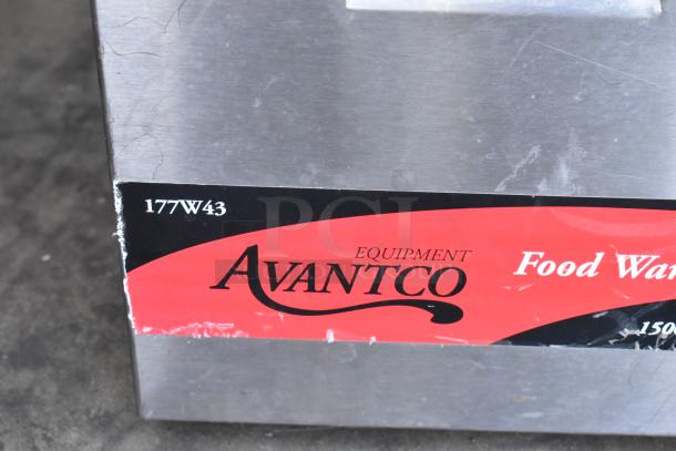 2 metal countertop food warmers, including Vollrath 1001 & Avantco 177W43, 115 volts, 1 phase, visible wear on Avantco model.