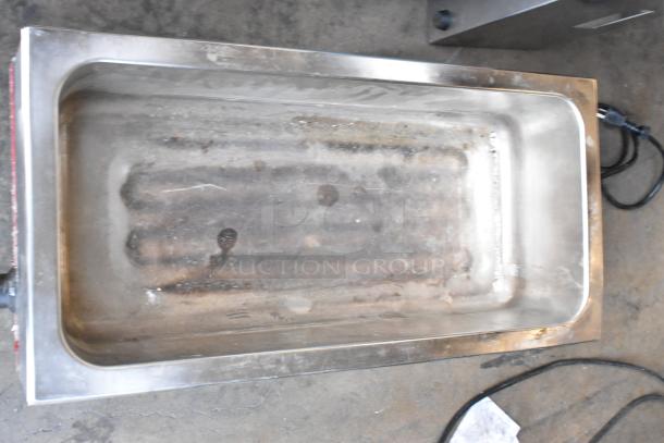 2 metal commercial countertop food warmers, Vollrath 1001 and Avantco 177W43, 115 volts, 1 phase, used condition.