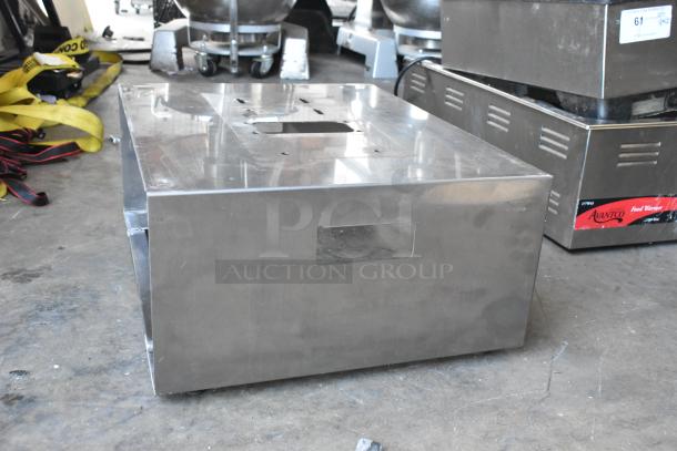Lot includes a metal wall mount shelf, a metal frame, and two poly silverware caddies. Items show signs of use.